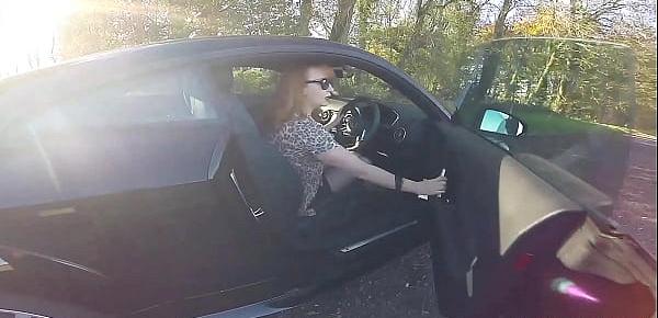  British mature Red fingers her cunt in the car again